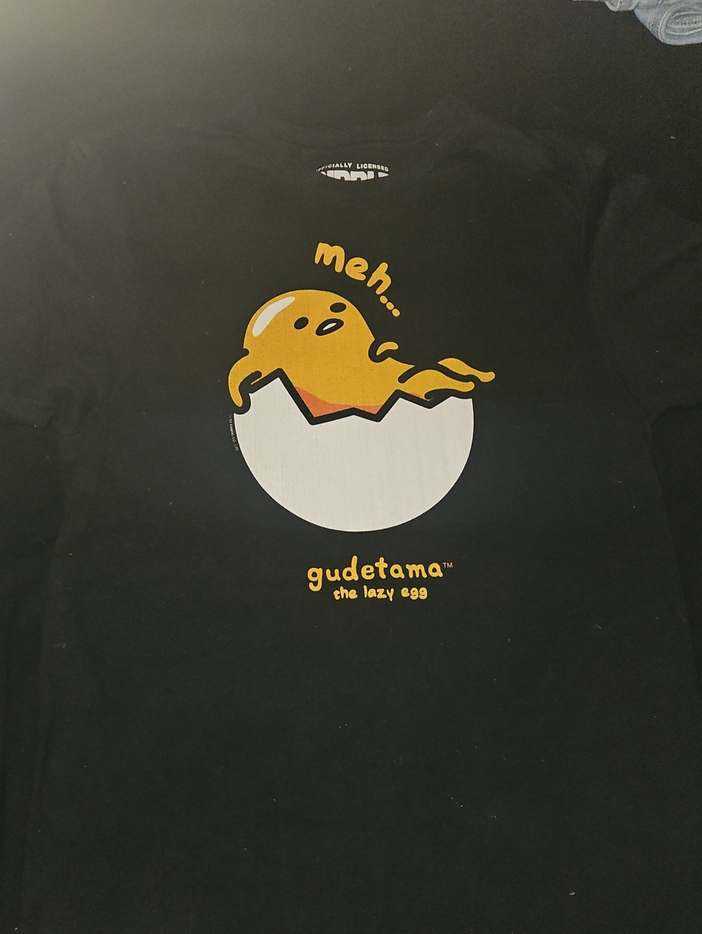 Gudetama Black Graphic Tee - 'Meh' Egg Short Sleeve Top